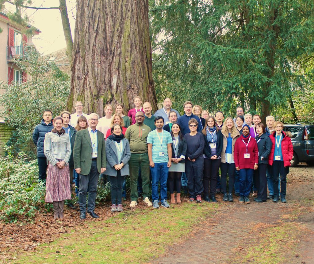 Participants group photo of the ISSI Bern workshop "Physical Links Between Weather and Climate in Space and the Lower Atmosphere