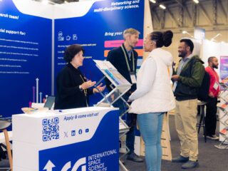 ISSI Bern at their exhibition booth at the IAU General Assembly 2024 in Cape Town, South Africa.