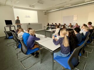 A school class visiting ISSI and listening to Fabio Crameri talking about science, scientists, and space. (Picture by S. Fontanelli)