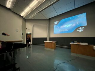 The Surprising Expansion History of the Universe –Public ProISSI Lecture by Nobel Laureate Adam Riess. Shown is Antonella Nota introducing the speaker. Photo by Fabio Crameri