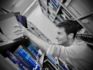 ISSI Science Program Manager Mark Sargent putting his live under the books to migrate your data to the new webpage.