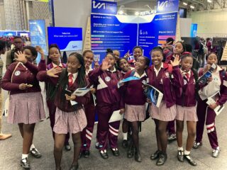 Capetonian school kids at the ISSI Bern booth during the IAU General Assembly 2024 in Cape Town, South Africa.