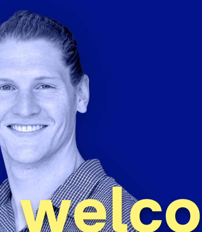 Portrait picture of Dr. Brian Welch on a blue background.